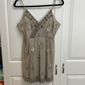 Silver Altar’d State dress with sewn appliqués and beading.